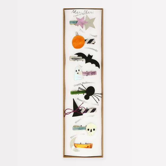 Decorative Halloween-themed wall art with various elements on a white background