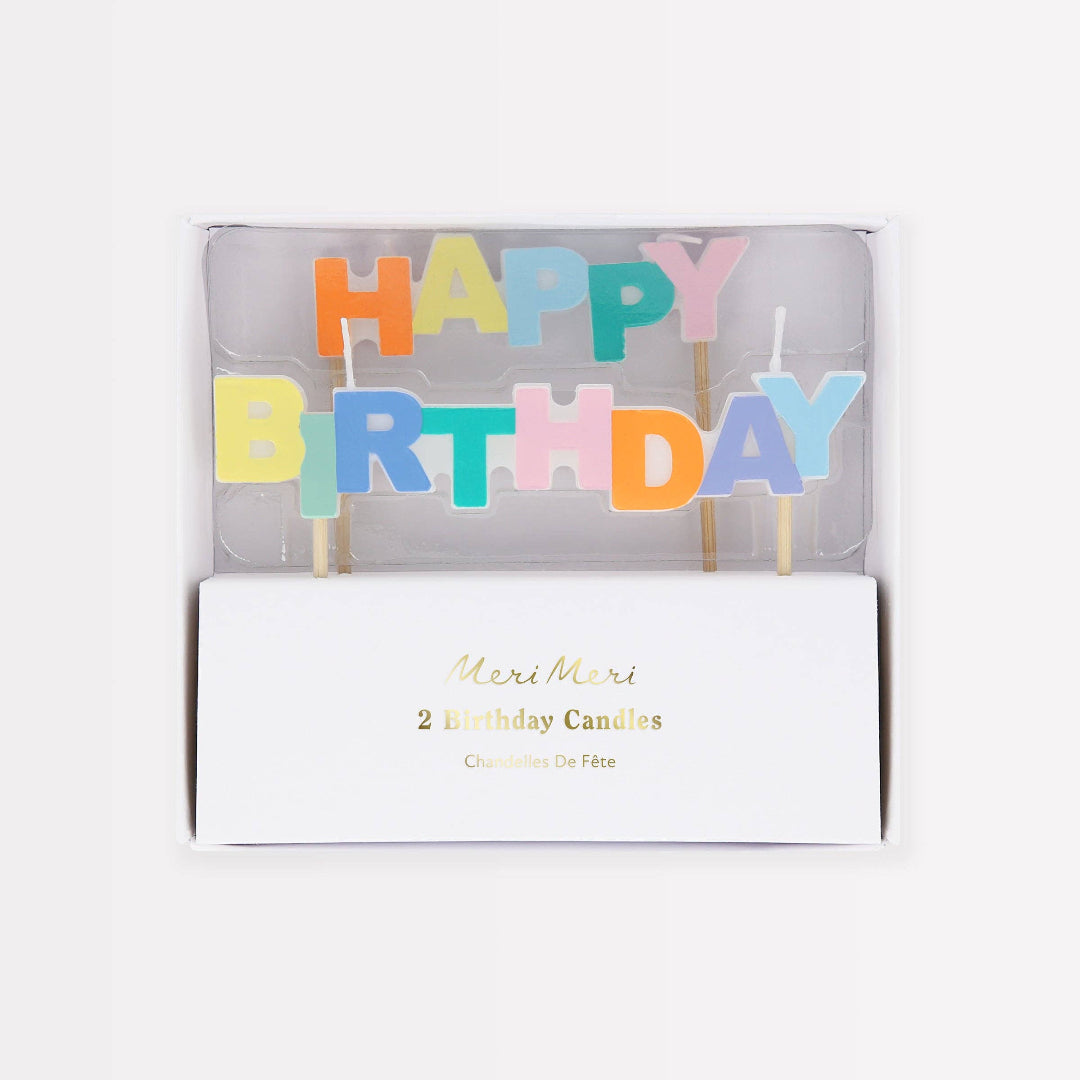Set of colorful 'Happy Birthday' candles in a box
