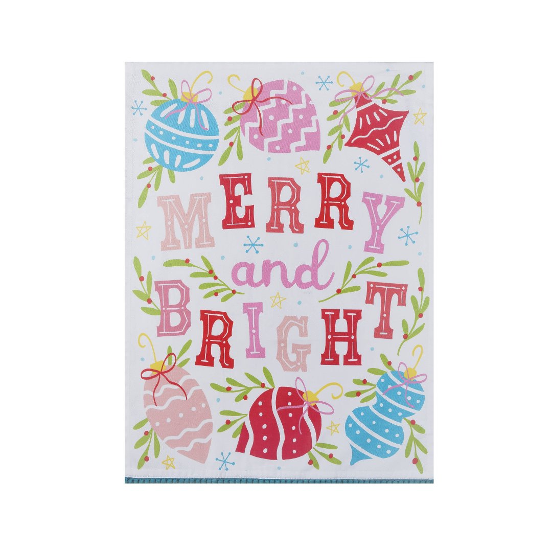 Kitchen towel saying Merry and Bright with pom pom edge