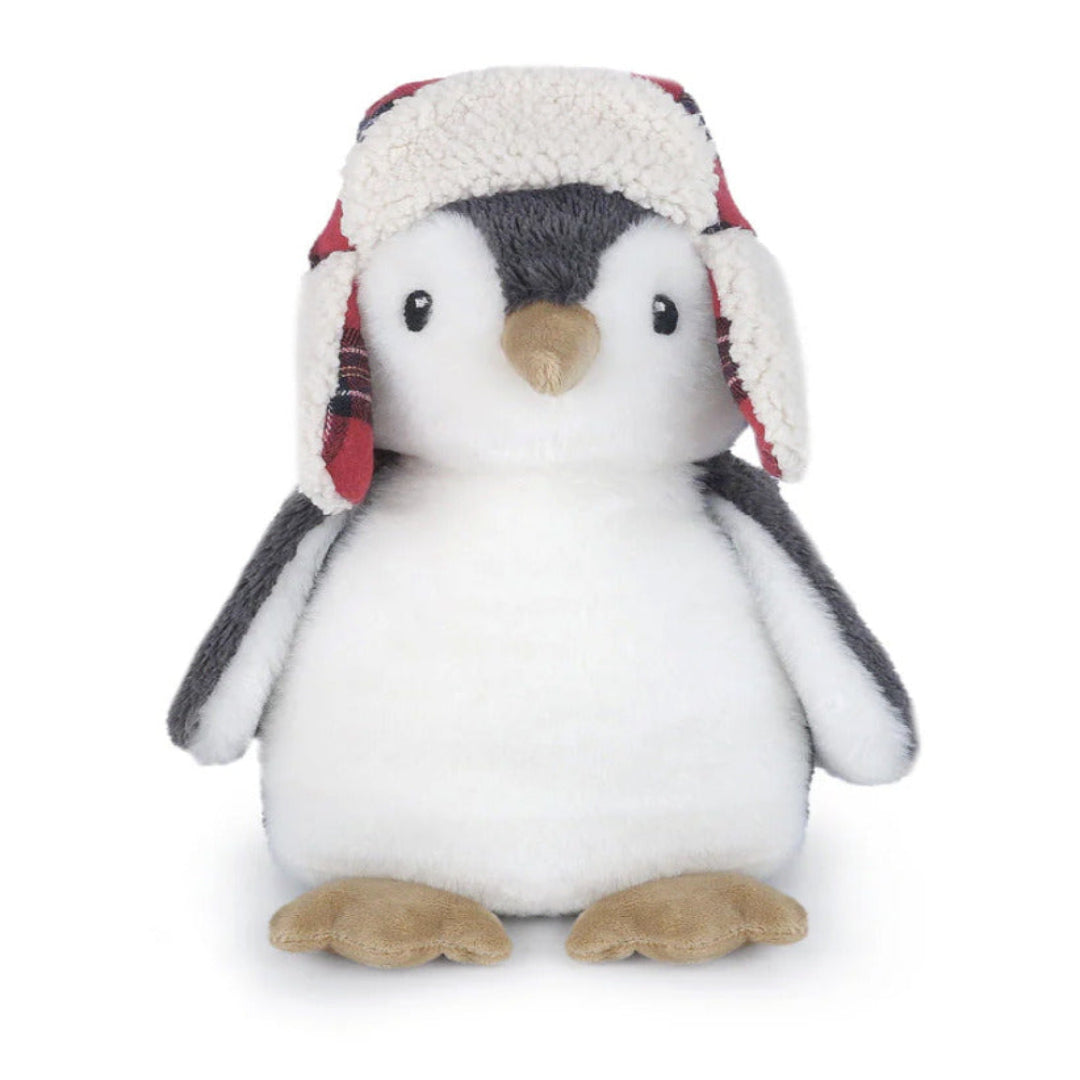 Plush penguin stuffed animal wearing red plaid winter trapper hat with sherpa lining