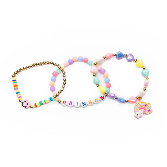 Set of three pastel colorful beaded bracelets with smiley face charm, rainbow charm and letter beads spelling "rainbow" from Great Pretenders