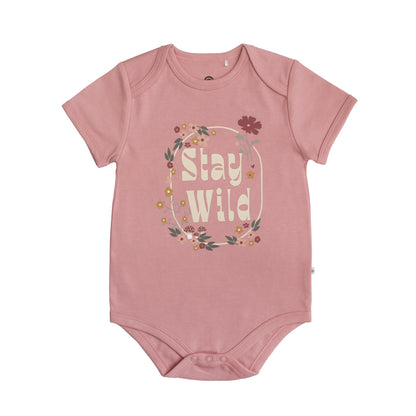 pink onesie with words on front.