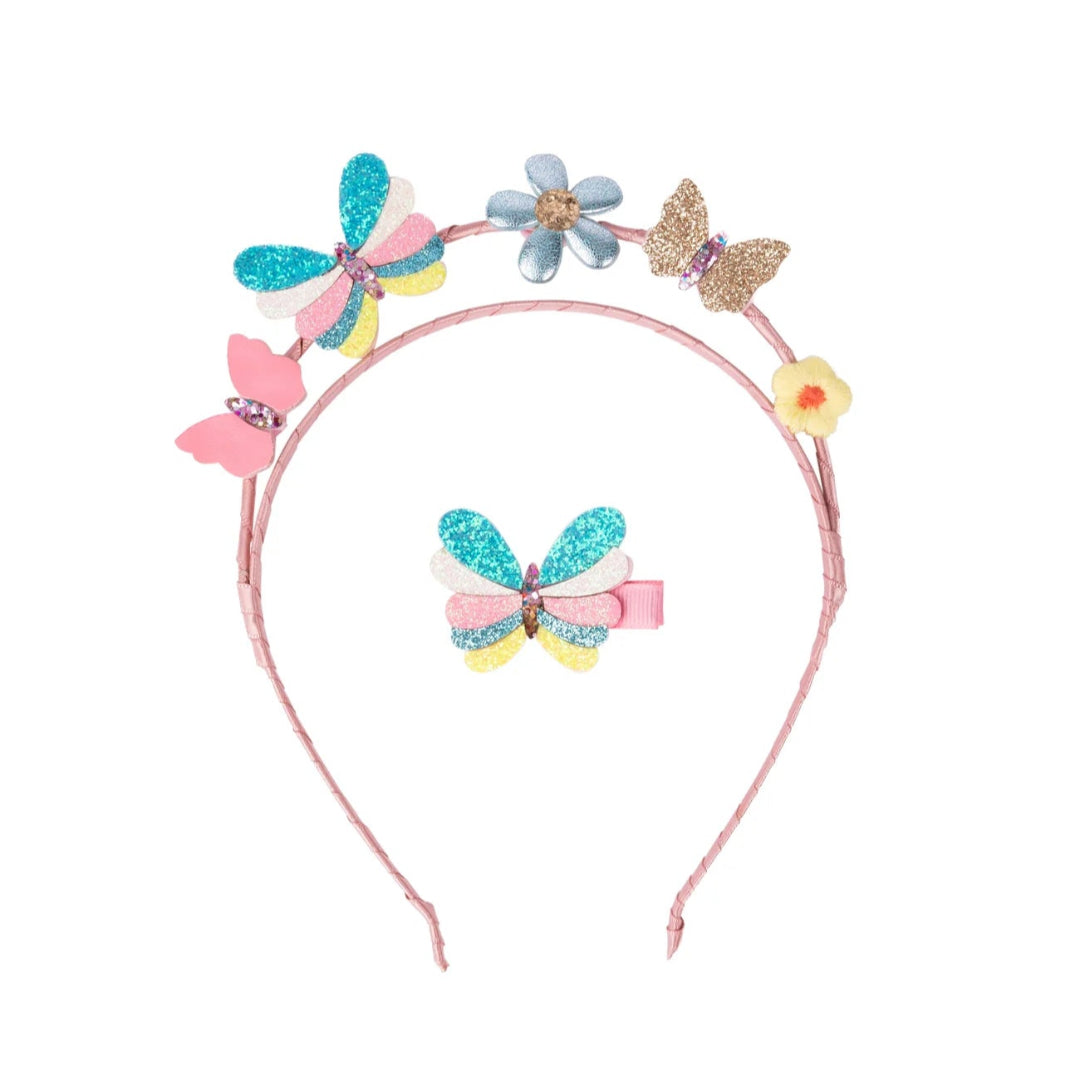 Pink headband with pink, gold, pastel colored butterflies and flowers on it and a matching butterfly hair clip from Great Pretenders 
