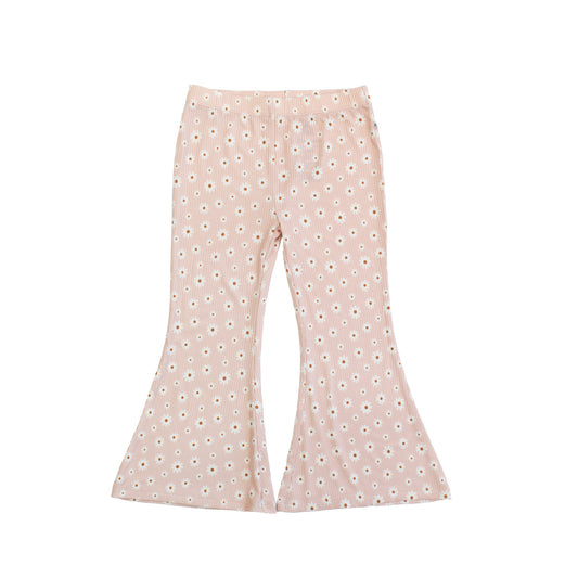 Pink flared pants with a subtle pattern on a white background