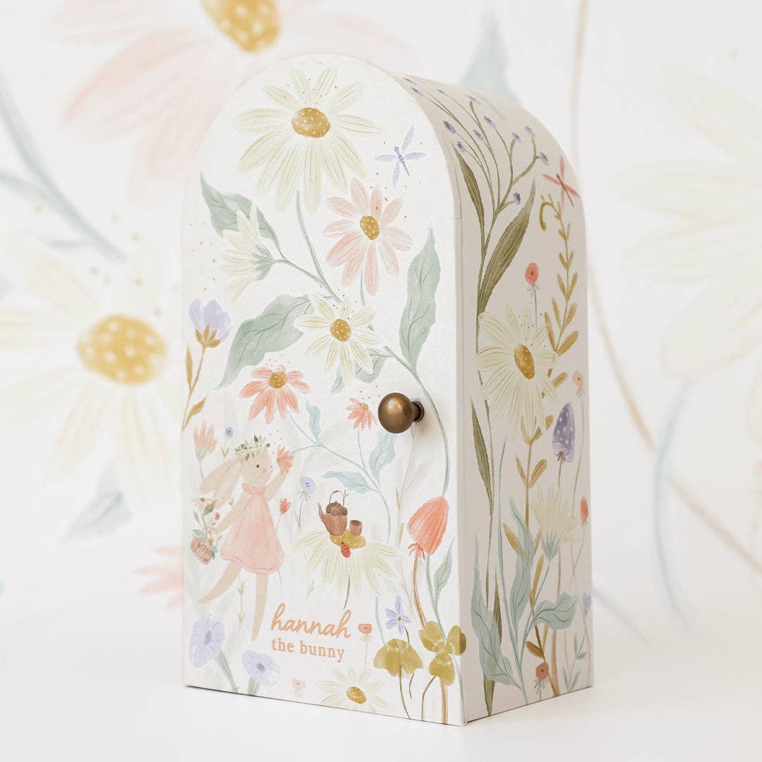 Decorative box with floral design and 'hannah the bunny' text on a white background