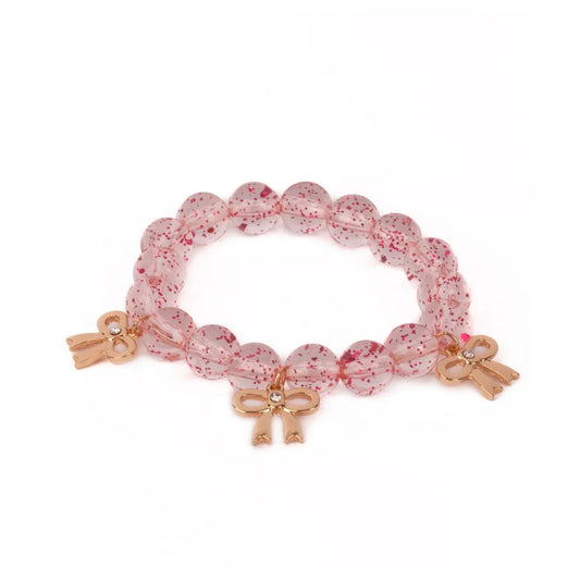 Beaded holiday bracelet features clear round crystal beads with red glitter accents, complemented by three precious gold bow charms from Great Pretenders 


