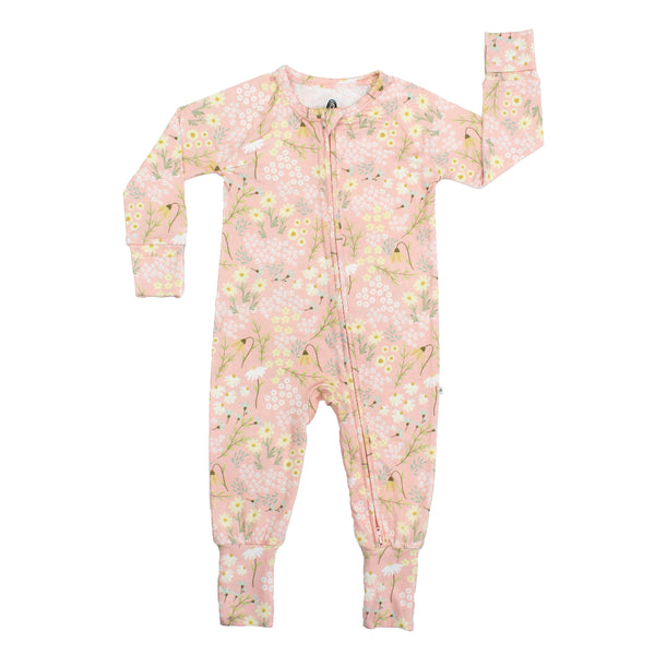 Pink floral baby onesie on a white background
