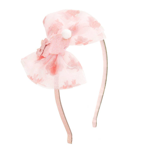 Pink headband with bow and tulle on a white background