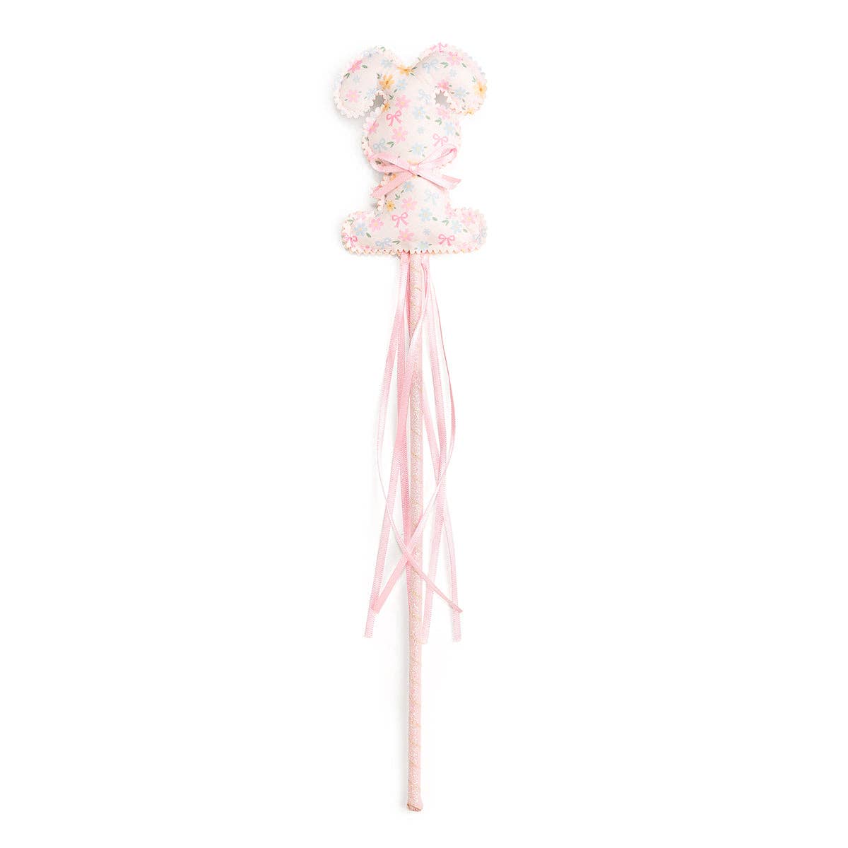 Decorative wand with a bow and tassels on a white background
