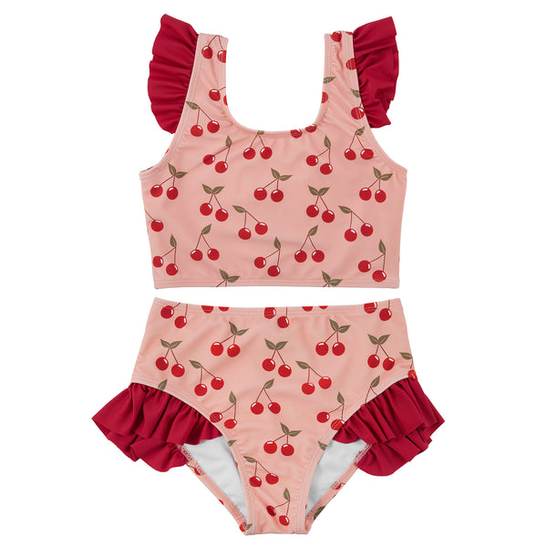 Two-piece swimsuit with cherry pattern on a white background