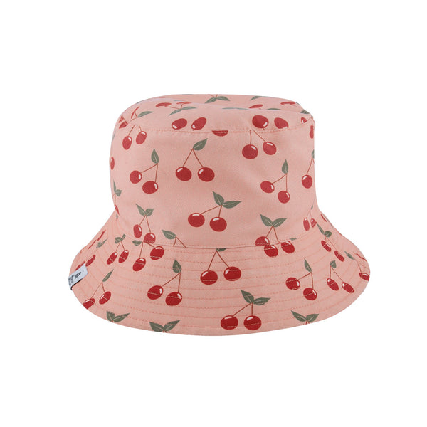Pink bucket hat with cherry pattern on a white background