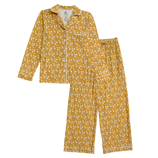 yellow women's pj set with white floral print.