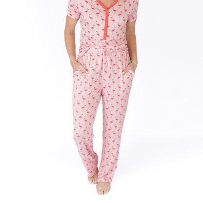 Pink flamingo-patterned pajama set on a white background