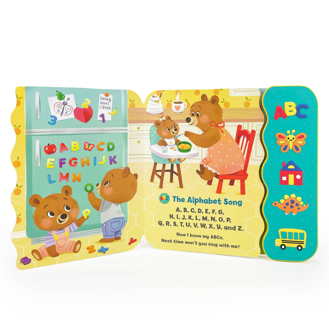 inside of the musical counting book opened to a page with a mama bear and baby bears doing different activities in the kitchen