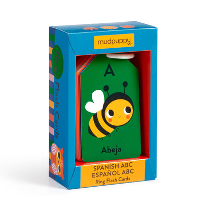 flash cards to learn spanish and english and in a blue box