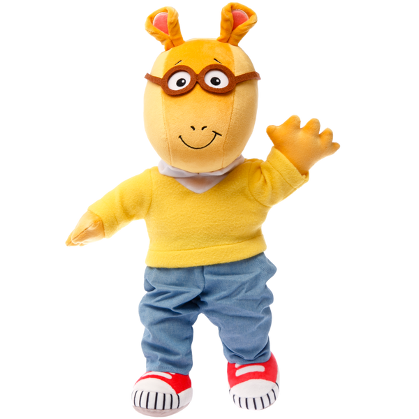 A plush toy of Arthur, a cartoon aardvark, wearing a yellow sweater, blue pants, and red sneakers, waving cheerfully.