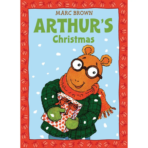 Arthur is on the cover of this book wearing a sweater and scarf and holding a gift