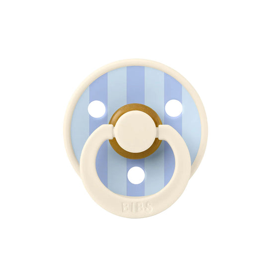 baby blue and ivory pacifier on white background