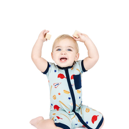 Baby wearing Play Ball baseball bamboo shortie romper