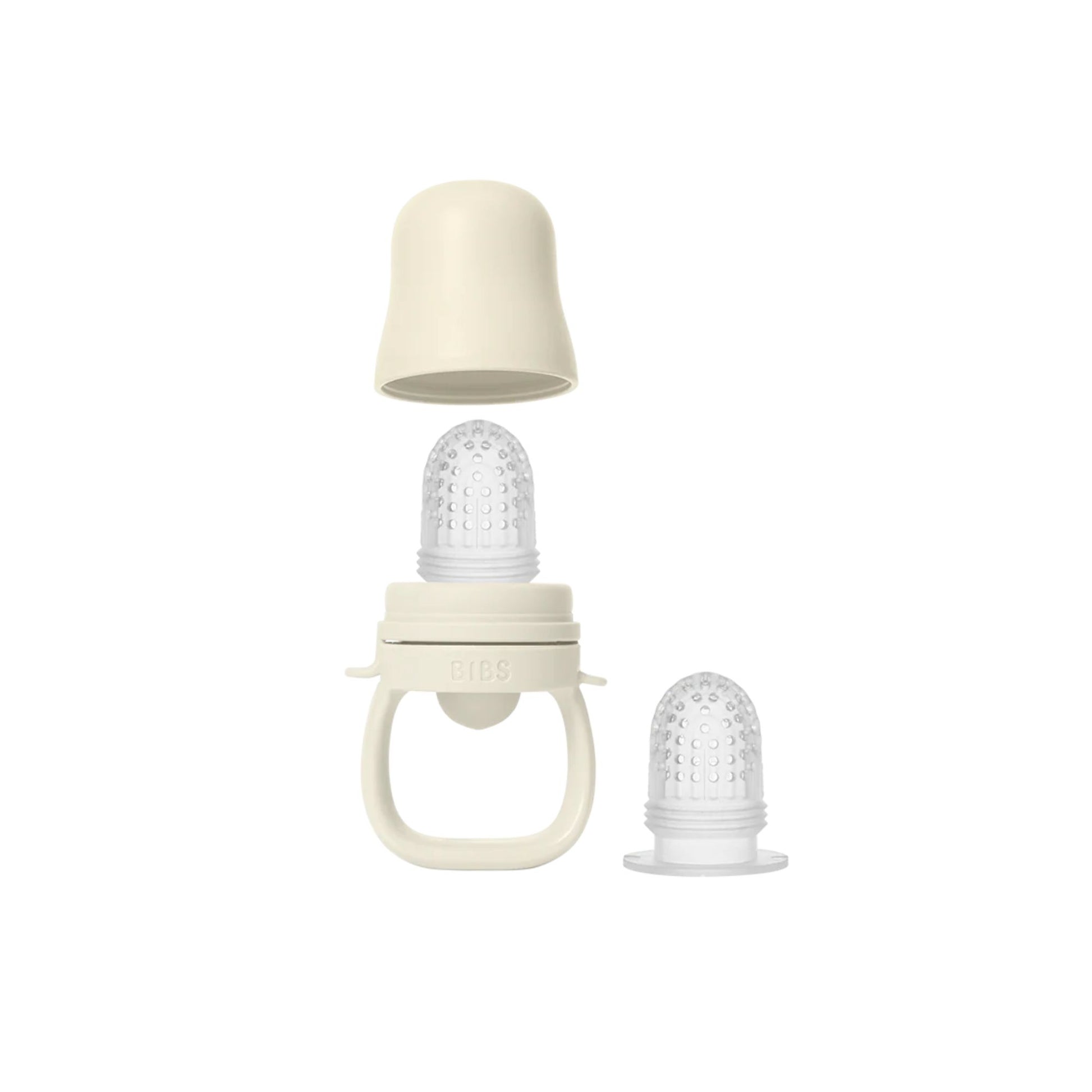 Baby bottle with two different nipples on a white background