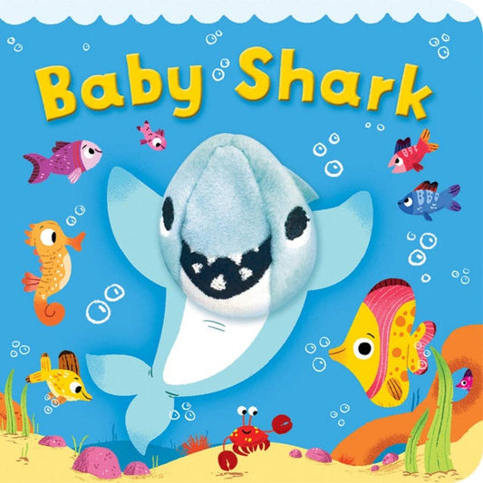Blue shark finger puppet on a blue board book with multi-colored fish