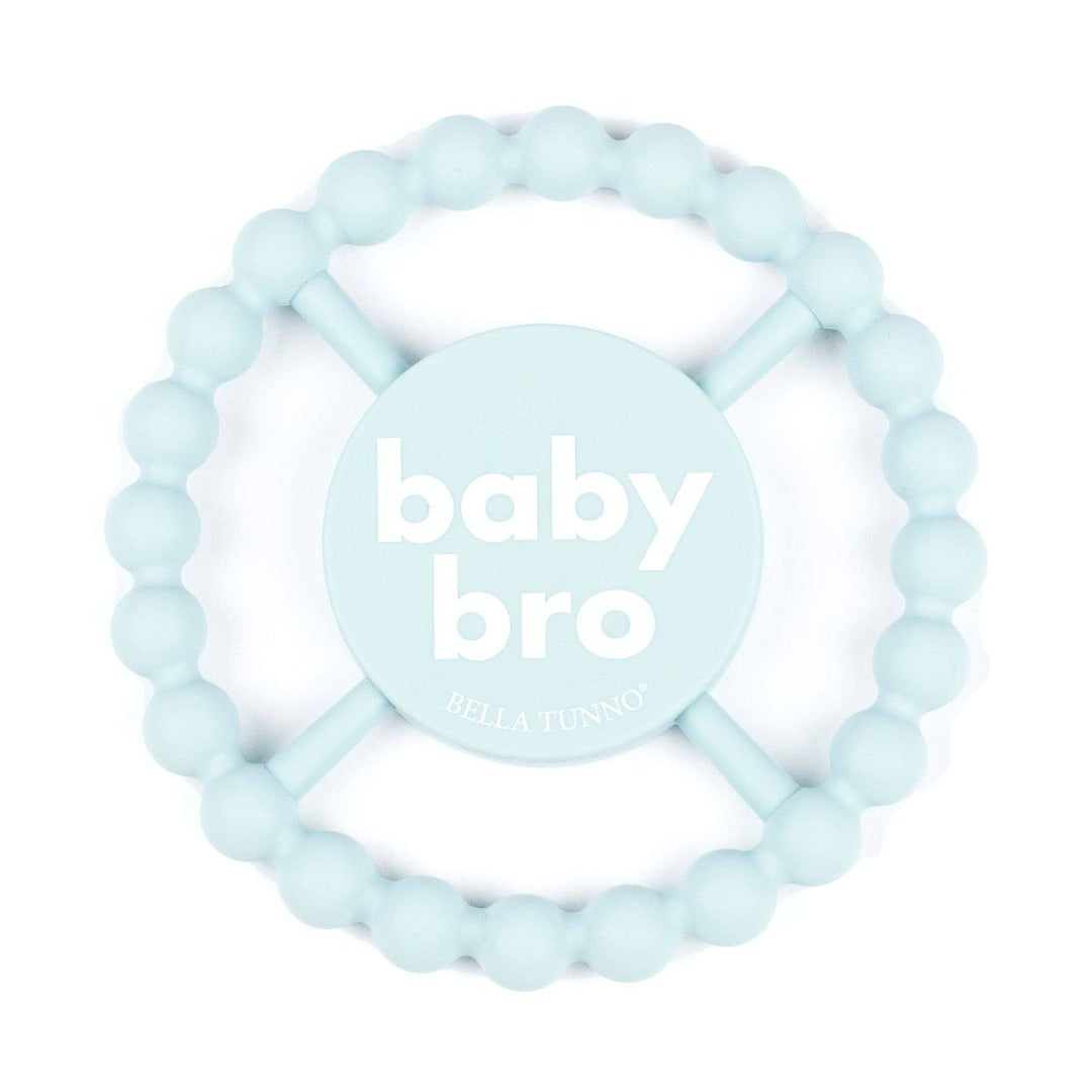 round baby blue baby teether that says baby bro in white letters