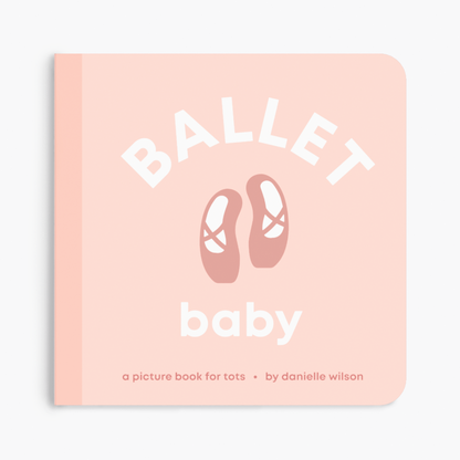a pink book with ballet shoes in the center of the book cover