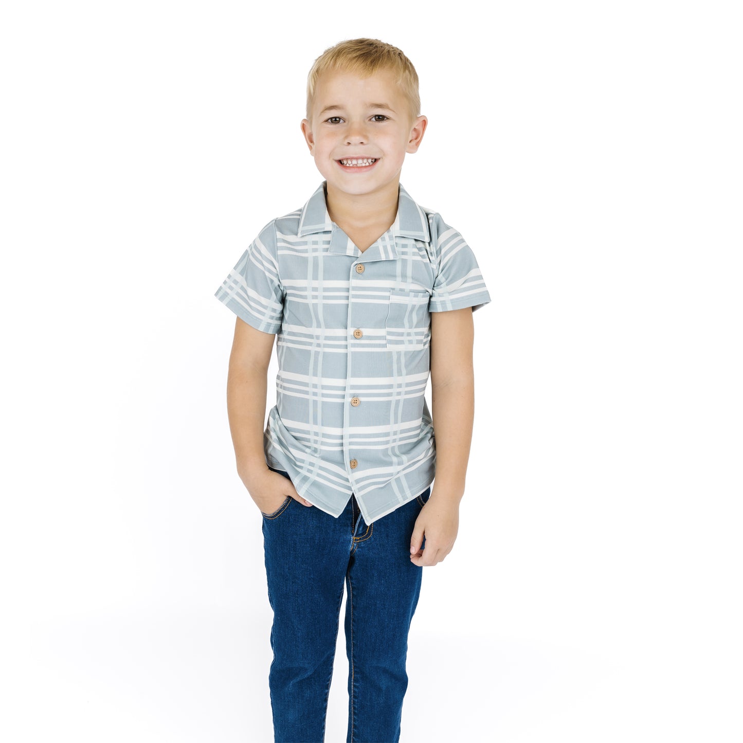 Boy wearing our Bamboo Blue plaid Button down shirt.