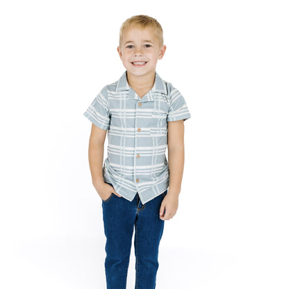 Boy wearing our Bamboo Blue plaid Button down shirt.