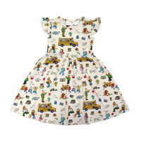 Twirl bamboo dress featuring playful illustrations of Arthur™ PBS Character, books, and school bus, a beige background.
