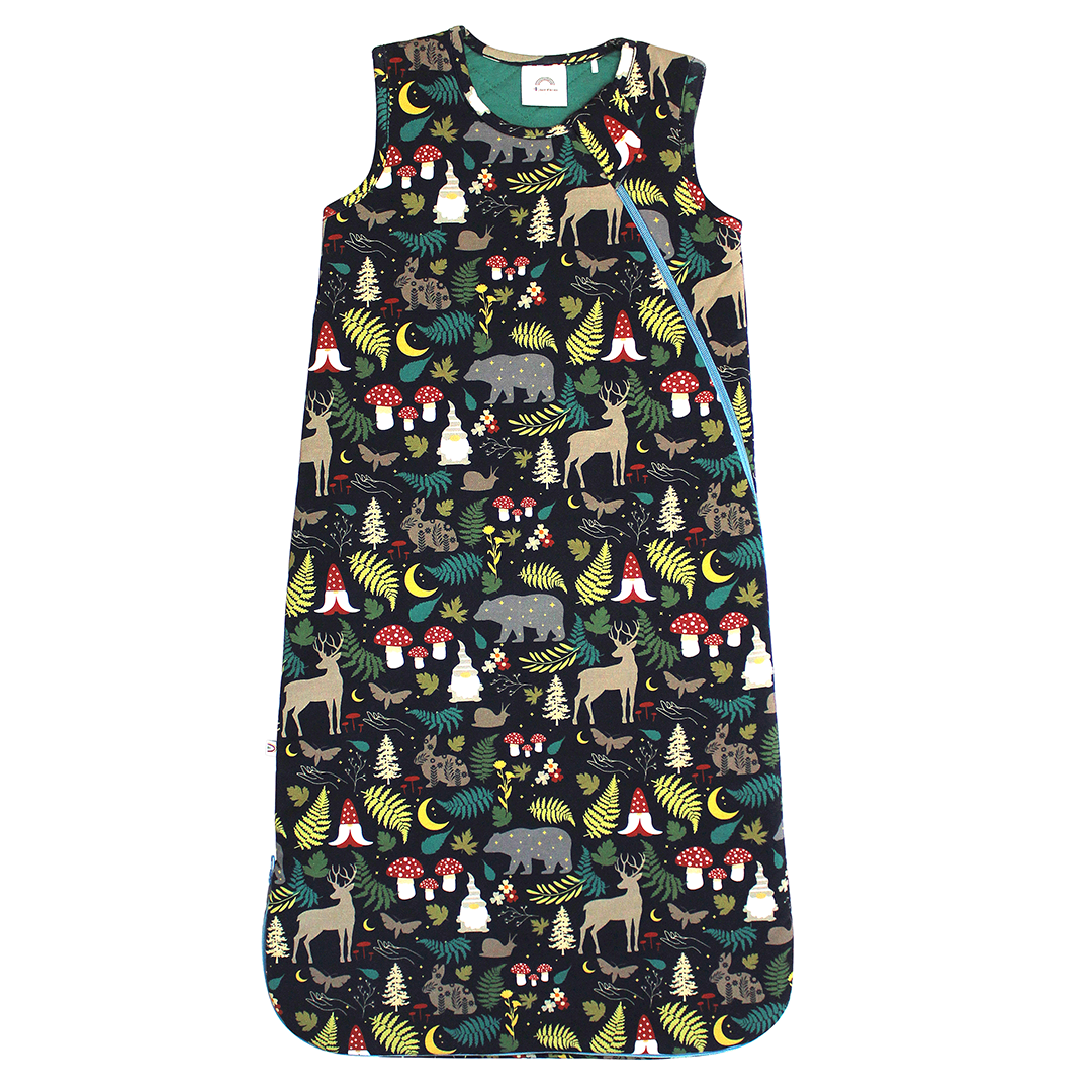 the "night forest" bamboo baby sleeping bag. the "night forest" print is a night time themed design. you can see an array of forest animals ranging from, deer, bears, bunnies, birds, forest trees and leaves, flowers, and mushrooms. there are also starts and moons scattered around to enhance the night time atmosphere. 