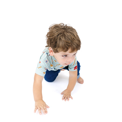 Child crawling on a white background