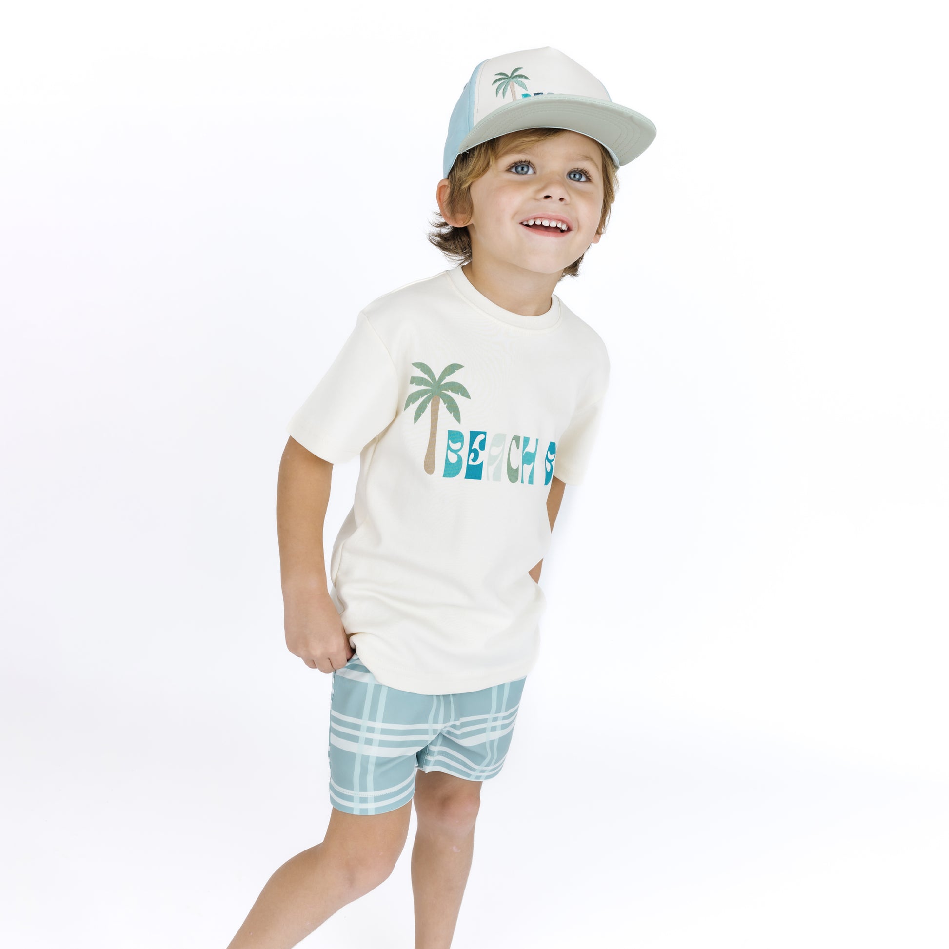 Kids wearing our Beach bum snapback hat and cotton Beach Bum shirt