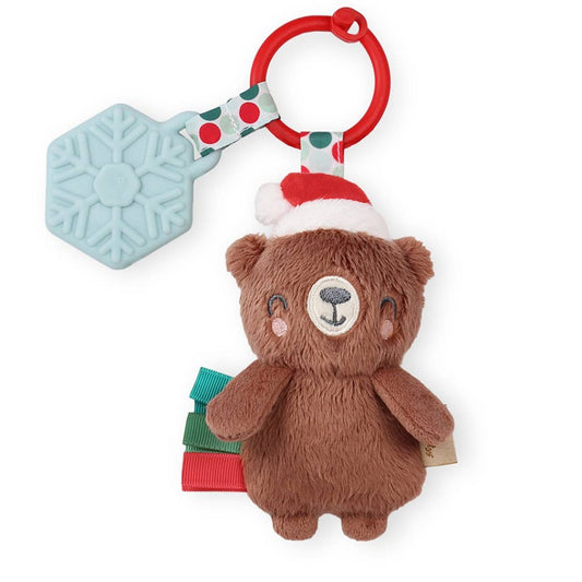 brown stuffed bear toy attached to a snowflake teether