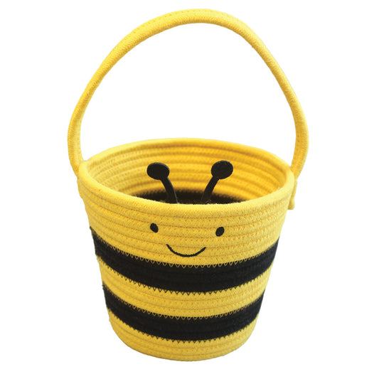 A charming yellow and black bee-themed rope basket with a smiling face and antennae, perfect for spring decor, Easter egg hunts, or toy storage.