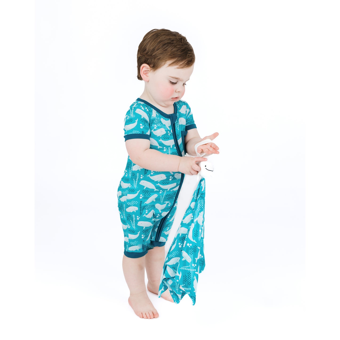 Baby holding our Beluga whale Lovey 