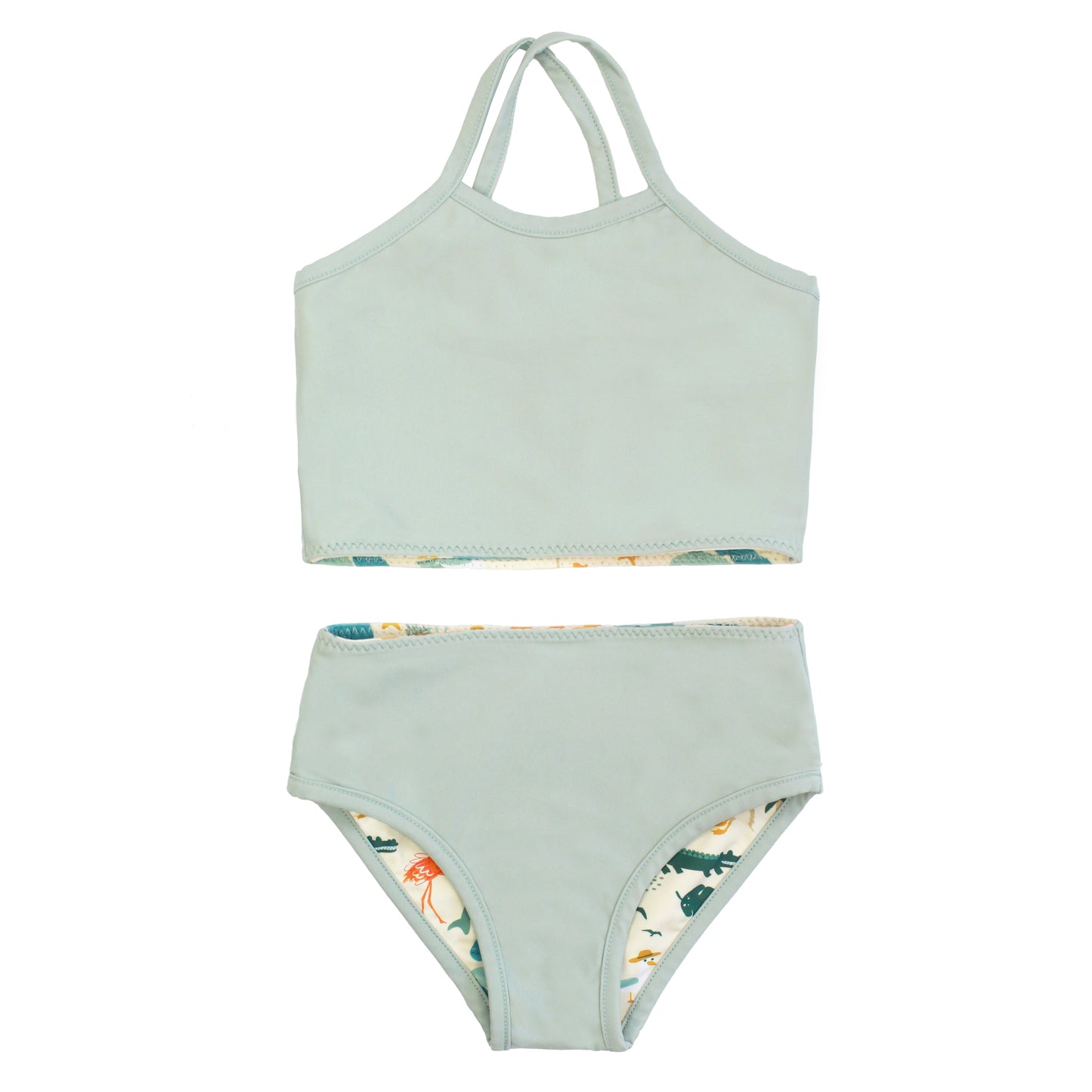The reversible side of the Explore Florida bikini, shown in a solid Blue Surf sage green color.