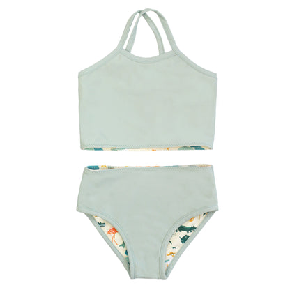 The reversible side of the Explore Florida bikini, shown in a solid Blue Surf sage green color.