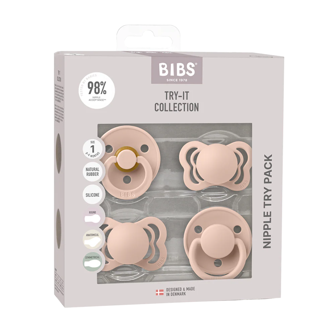4 pack of blush colored pacifiers
