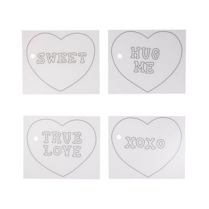Four heart-shaped tags with text 'SWEET', 'HUG ME', 'TRUE LOVE', and 'XOXO' on a white background.