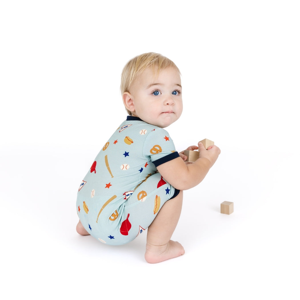 Baby wearing Playball Baseball Bamboo Shortie romper
