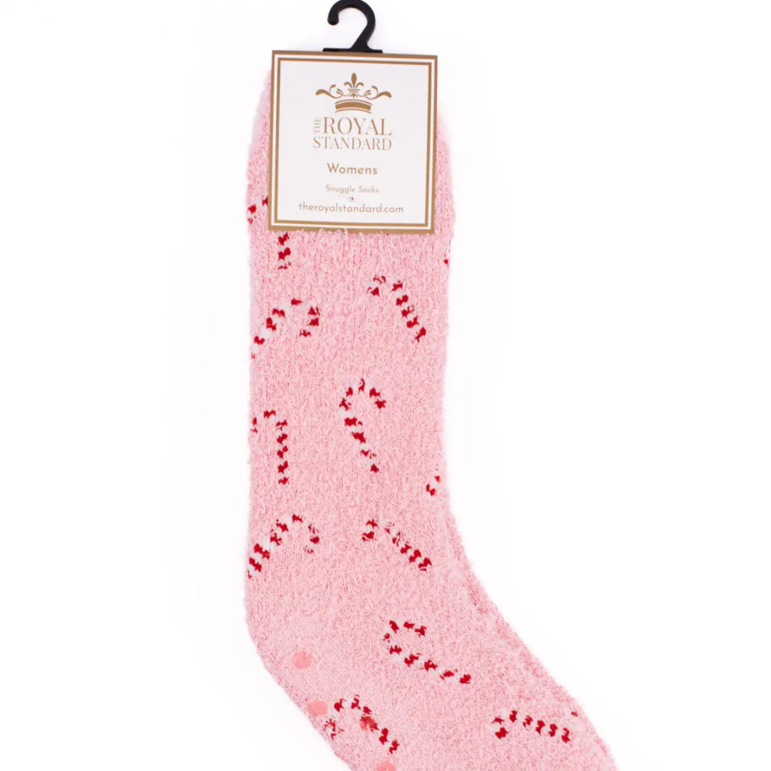 fuzzy socks for women that are pink with red and white candy canes on them