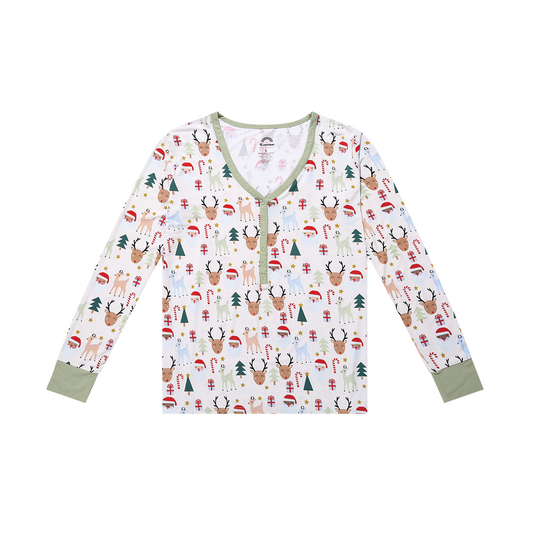 the "Santa and friends" women's top.the "Santa and friends" print is a Christmas themed pattern mixed with Santa heads, candy canes, reindeer, Christmas trees, Rudolph heads, and gold stars. this is all on a white background. 