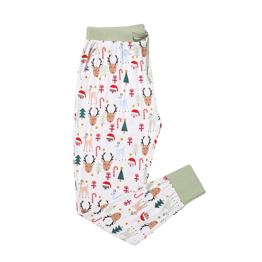 the "Santa and friends" women's jogger pants. the "Santa and friends" print is a Christmas themed pattern mixed with Santa heads, candy canes, reindeer, Christmas trees, Rudolph heads, and gold stars. this is all on a white background. 