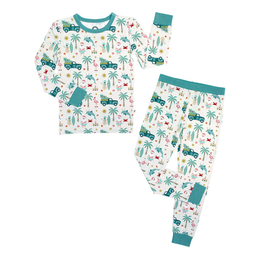 Children's pajama set with tropical pattern on a white background