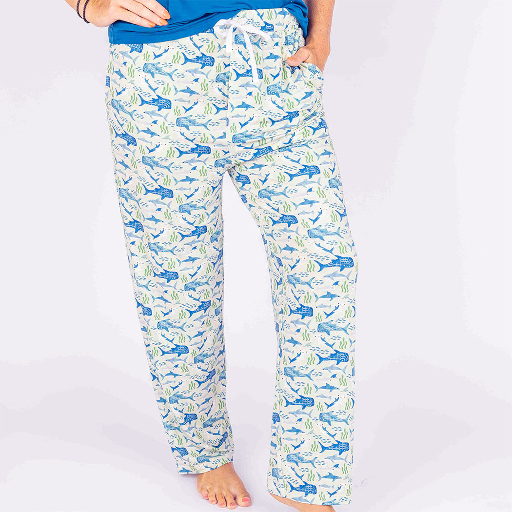 Woman standing in our Shark Friends Bamboo Relaxed Lounge Pajama Pants. The picture is only waist down. 