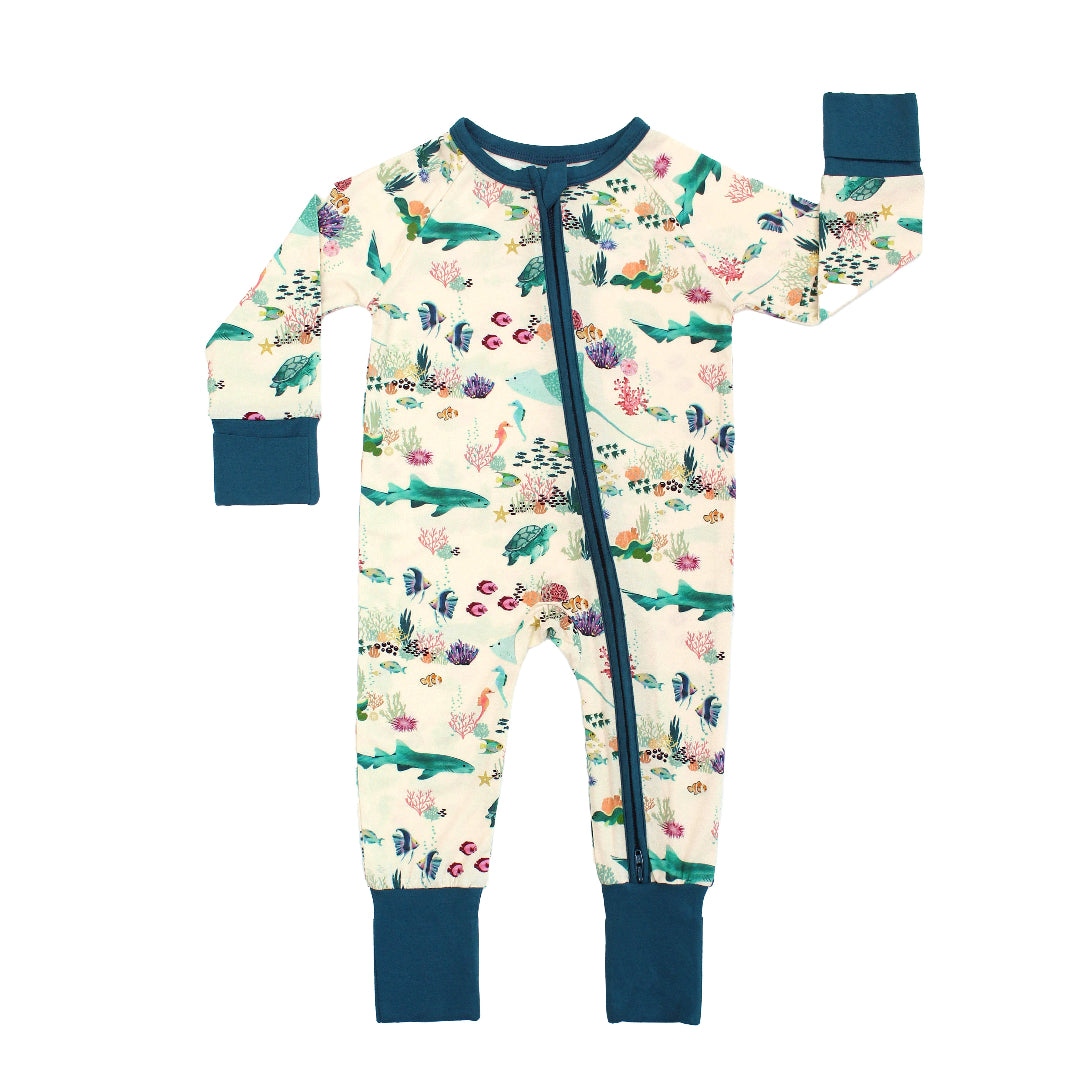 Coral Reef Bamboo Convertible Baby Pajamas by Emerson and Friends, featuring a vibrant ocean-themed print with sharks, sea turtles, and coral reefs. Made from ultra-soft bamboo fabric with fold-over cuffs and a two-way zipper for easy diaper changes.