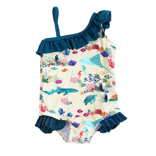 Emerson and Friends Coral Reef Ruffle Leg One Piece Girls Swimsuit, featuring a vibrant ocean-inspired print with sharks, sea turtles, and coral, designed with adorable ruffle accents and a secure fit for fun beach and pool days.