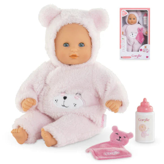 12 inch baby doll dressed in a light pink bear suit