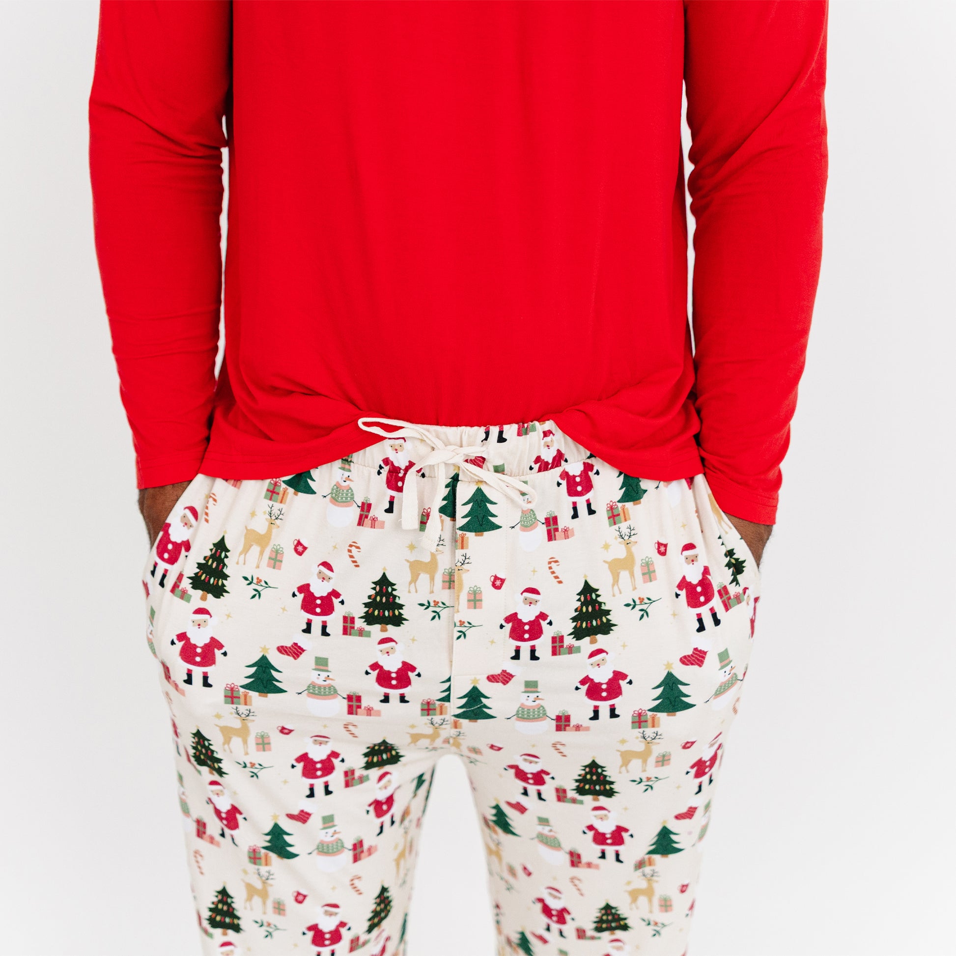 Close-up of Cozy Christmas bamboo relaxed fit pants highlighting soft fabric, functional pockets, and festive holiday print.